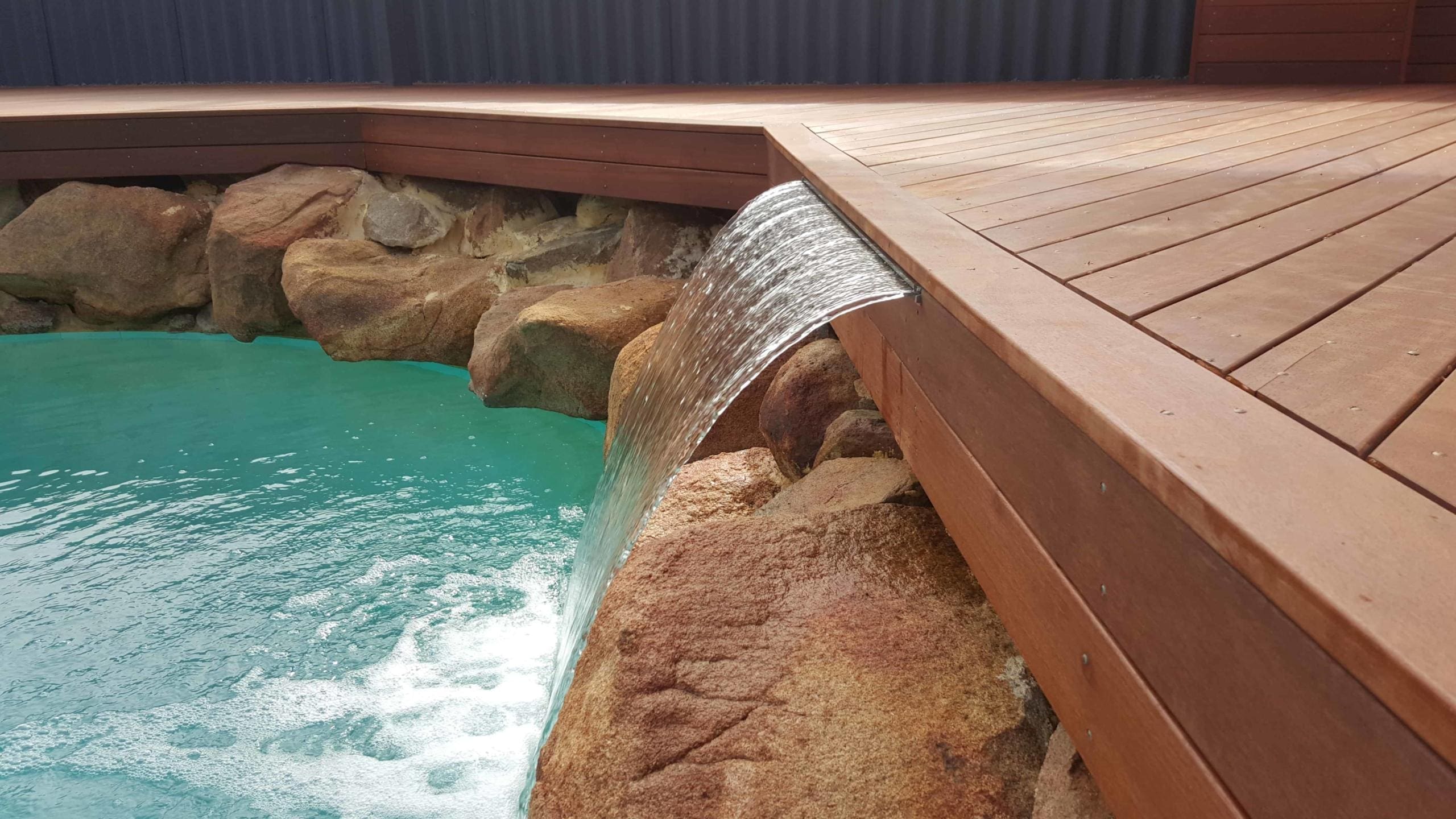 Hard Wood Decking and Rock Pool Header